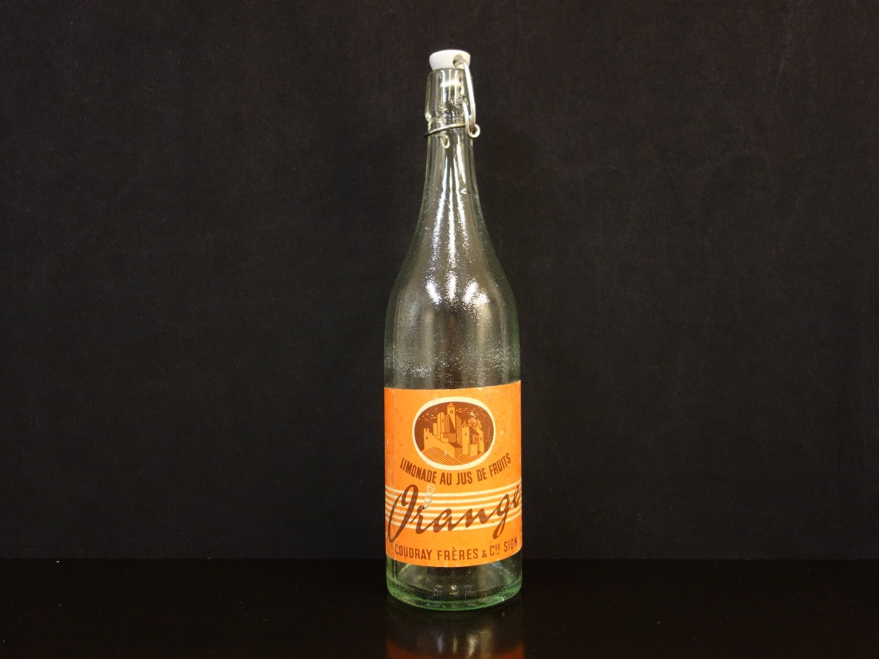 Gläser, Krüge & Flaschen: alte Flasche COUDRAY FRÉRES SION ORANGE 1955 – Gebraucht aus Kerzers von Flaschenposten