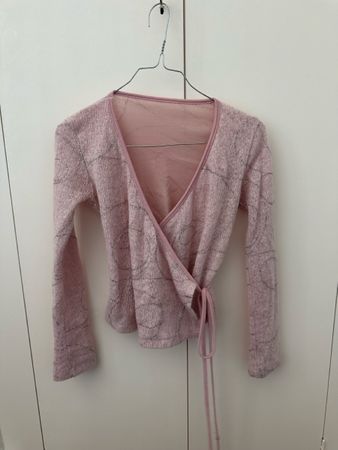 Gilet cache-cœur rose à motifs brillant