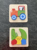 2x Holzpuzzle Traktor & Krokodil