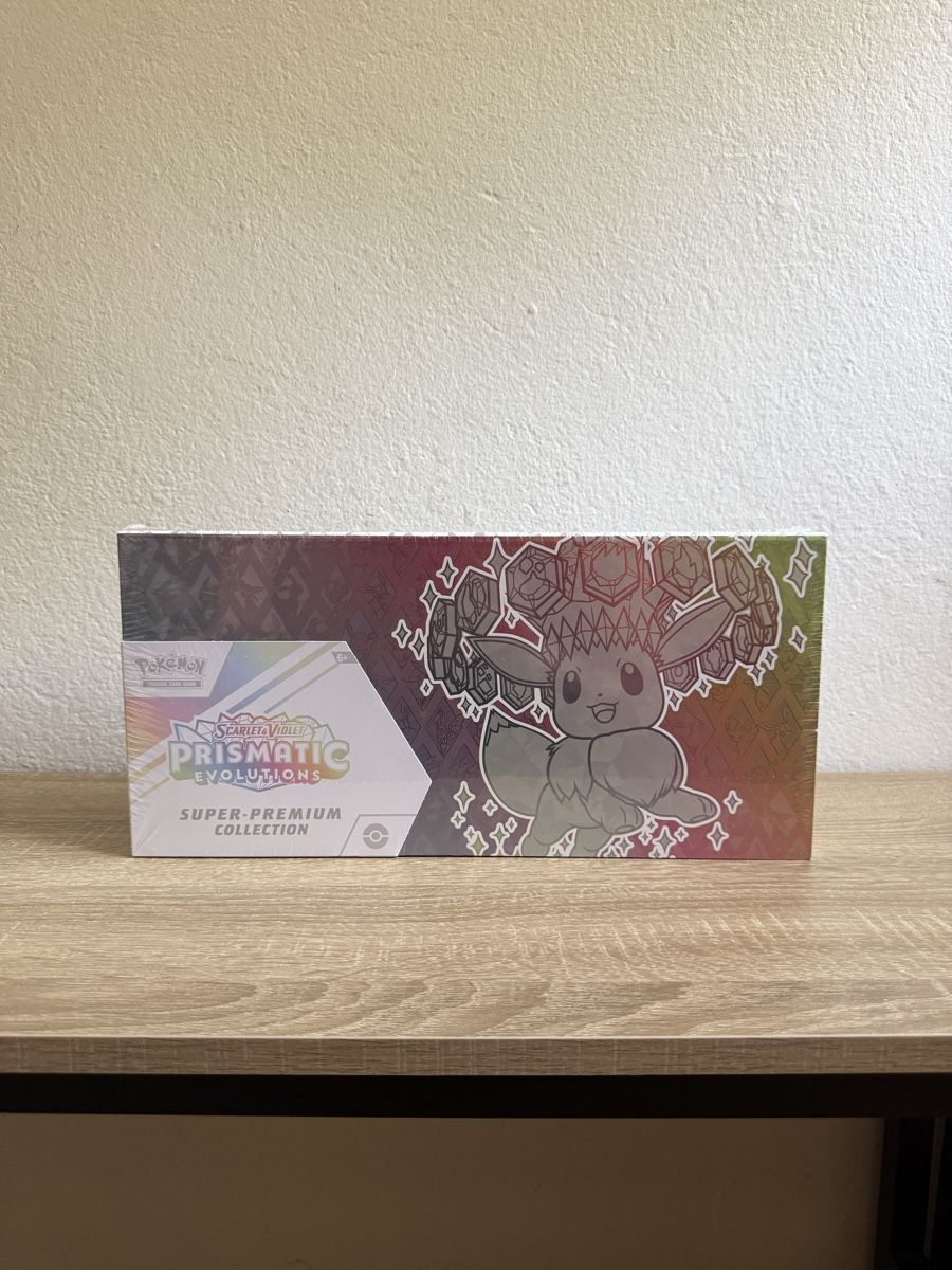 Pokémon Cartes à collectionner: Pokemon Prismatic Evolutions Super Premium Collection ENG – Neuf avec emballage d'origine à Gandria par PokeBrothersCH