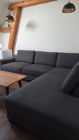 Grosse Eckcouch, dunkler Stoff