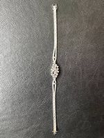 Splendide bracelet or gris et diamants