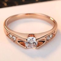 Charmanter vergoldeter Ring mit weissem Stein Gr. 8