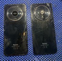 Lot 2 téléphones Redmi avec écrans cassés