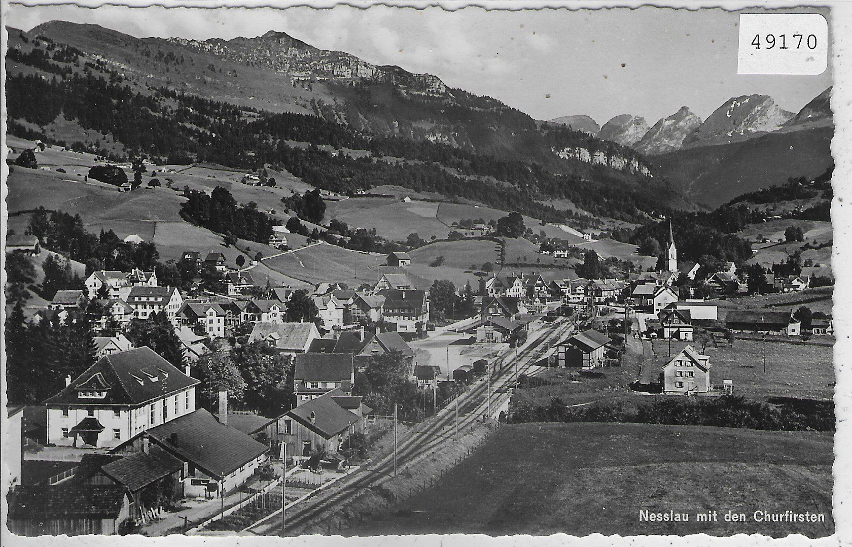 Cartoline postali: Nesslau mit Bahnhof und Churfirsten – Usato da Ettingen venduto da Kartenplanet