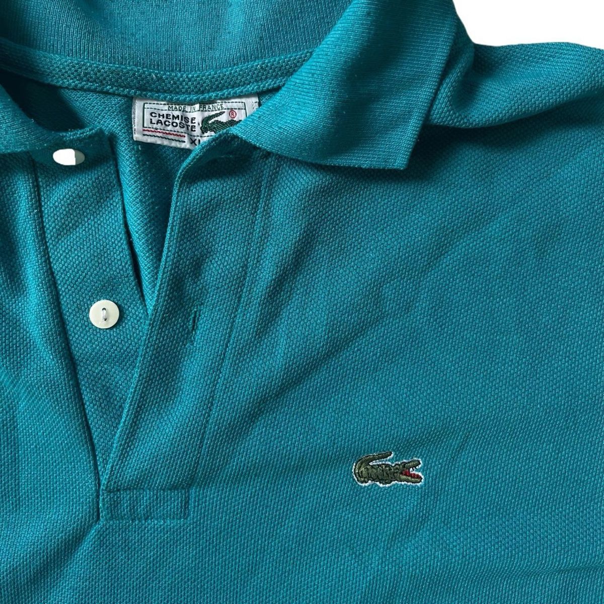 Lacoste Magliette Polo: Lacoste Polo Tshirt Turquoise with Armprint – Usato da Riehen venduto da art_c76v 1