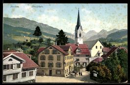 AK Nesslau, Dorfplatz mit Kirche, Häuser und Landschaft