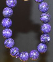 Armband A-948 – Russische Charoite 12mm Perlen – elastisch