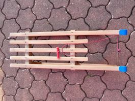 Holzschlitten