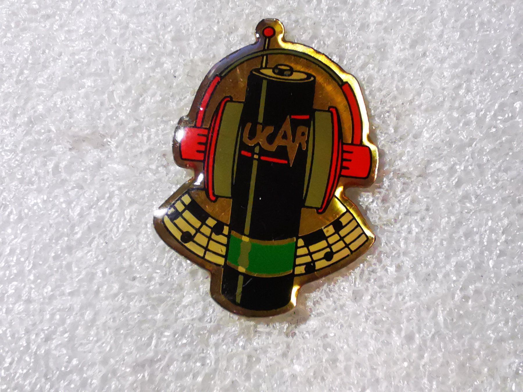 Plaketten & Abzeichen: Ansteckpin 121: Ucar – Gebraucht aus Oppligen von Pin-Fall-Shop