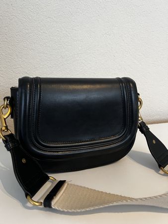 Black crossbody bag with beige strap. Great condition!