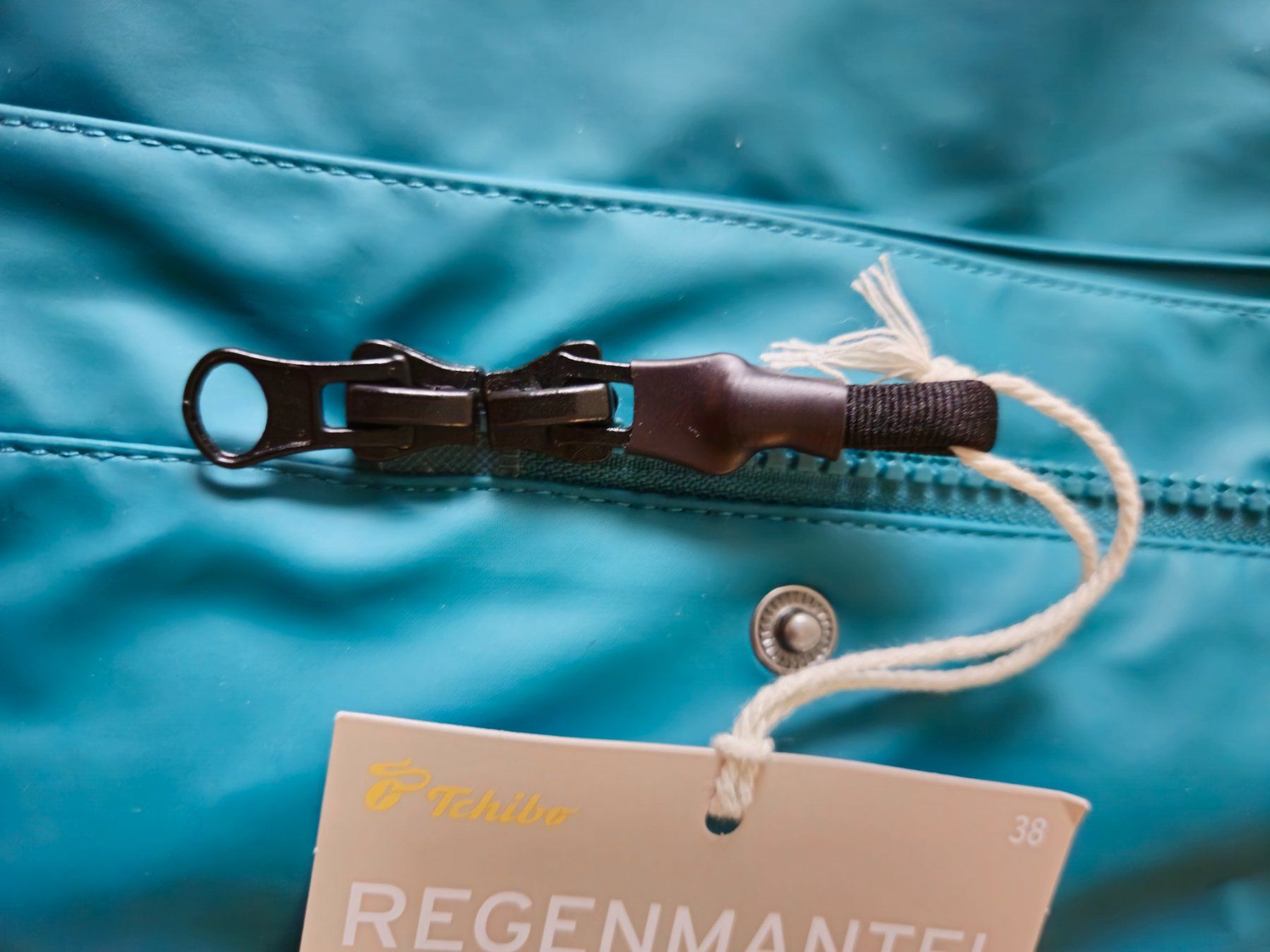 Tchibo Jacken: REGENMANTEL Tchibo, Grösse 38, Farbe 'petrol' – Neu (gemäss Beschreibung) aus Münchenstein von Lenzrose 5