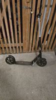Ein Micro Black Scooter zu Verkaufen