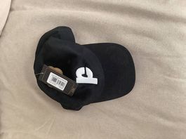 Black cap with a P