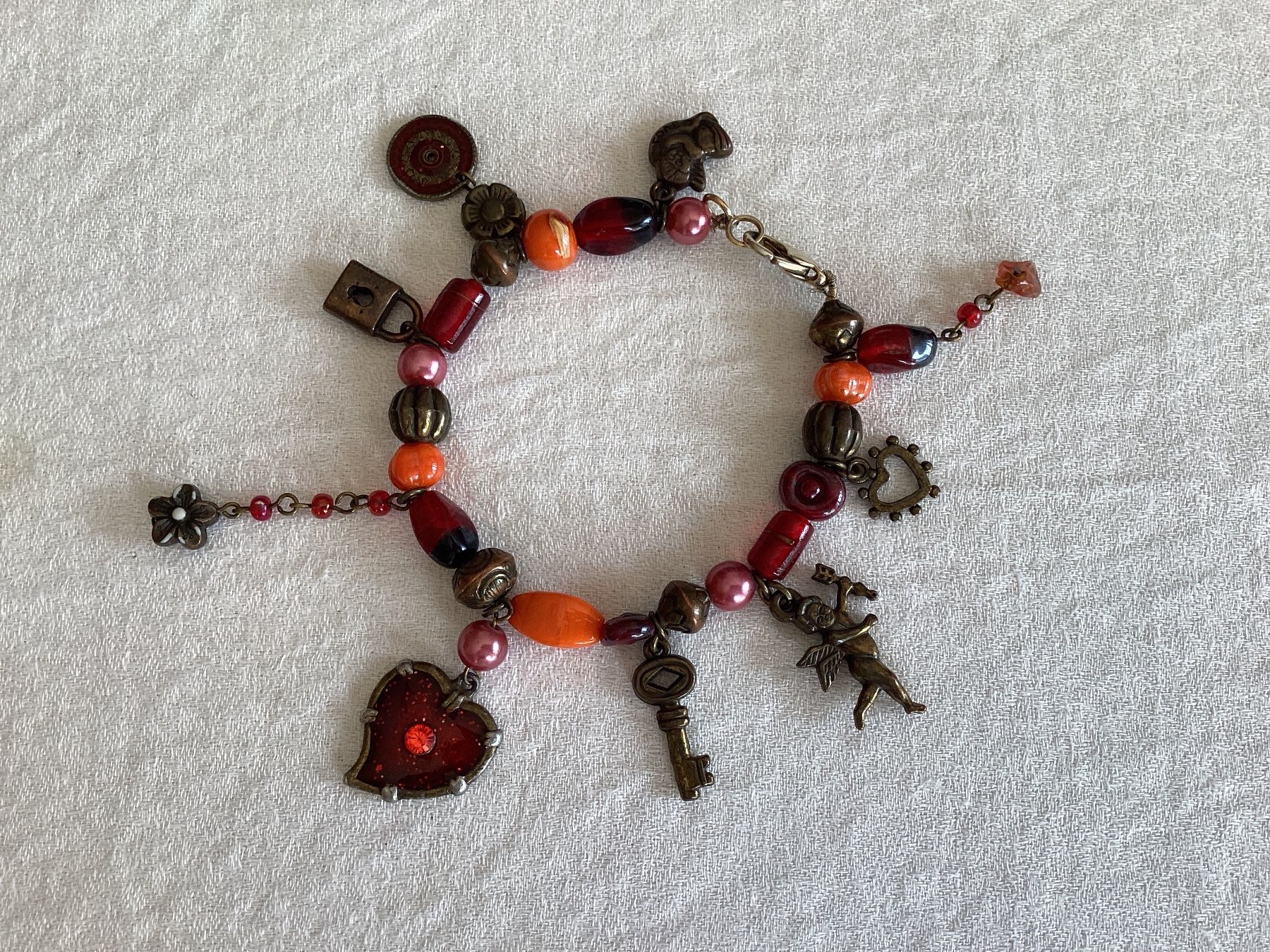 Bracciali & Braccialetti: Bracelet à pendeloques – Usato da Pully venduto da claddagh 1