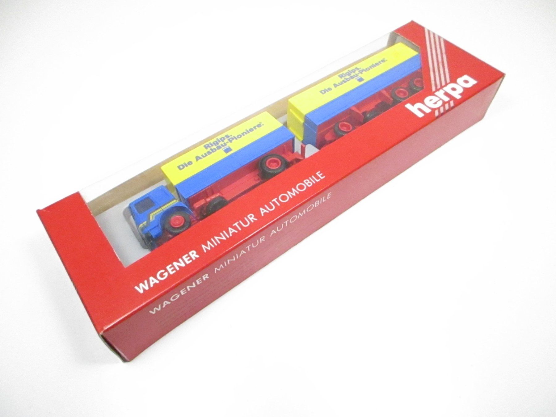 Herpa Modellini d'auto: Herpa H0 MAN Hängerzug RIGIPS – Nuovo e nell'imballaggio originale da Olten venduto da Heinrich875 2