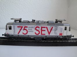 HAG 088 HO. locomotive CFF Re 4/4, 75 ans du SEV, avec boite