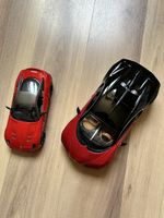 Modellautos Ferrari und Bugatti neuwertig 