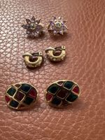 3 paires de boucles d’oreilles dorées selon photo