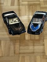 Zwei Pontiac Firebird in Matchbox Grösse von Yatming u.Maist
