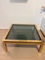 Square brass and glass coffee table, well-preserved.