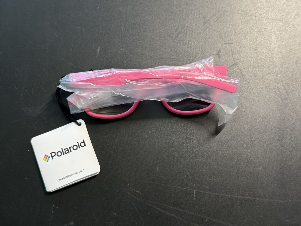 Polaroid Lunettes & Verres: Pinke Kindersonnenbrille – Neuf avec emballage d'origine à Thalwil par MB-7 1