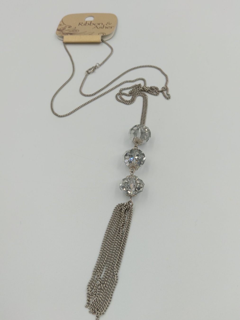 Colliers: Lange Modeschmuck-Halskette, silberfarben mit Quaste – Neuf avec emballage d'origine à Bäch SZ par Swissy46 3