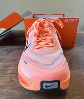 Nike Vomero Plus Orange Pulse