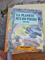 Livre jeu La Planète aux 100 pièges Grund état d'occasion