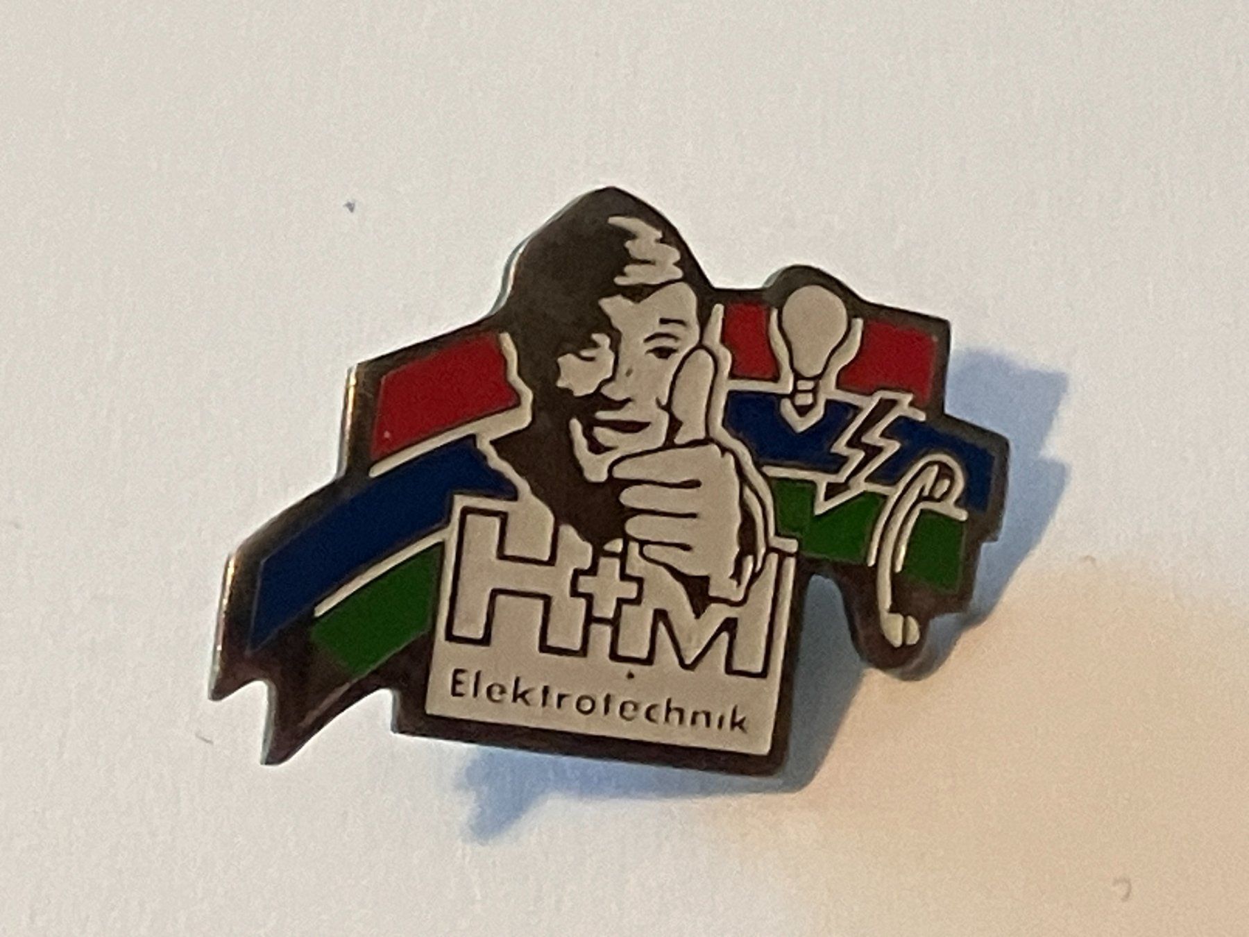 Placchette & Badge: 1 Pin H&M Elektrotechnik – Usato da Basel venduto da djwwpp