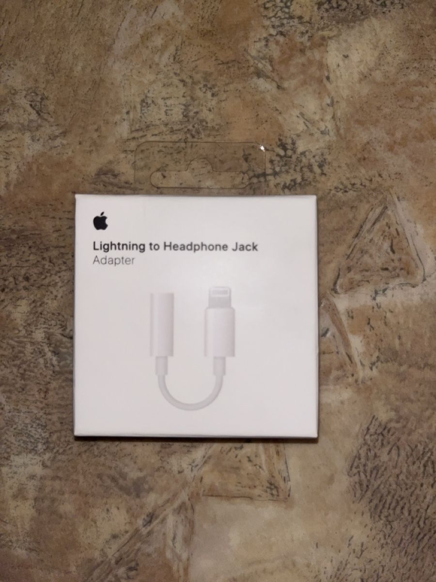 Apple Unità & Adattatore: Apple Lightning auf 3.5mm Kopfhörer Adapter neu – Nuovo e nell'imballaggio originale da Rümikon AG venduto da Tati72
