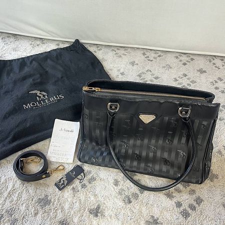Maison Mollerus Sulz Tasche, schwarz & gold