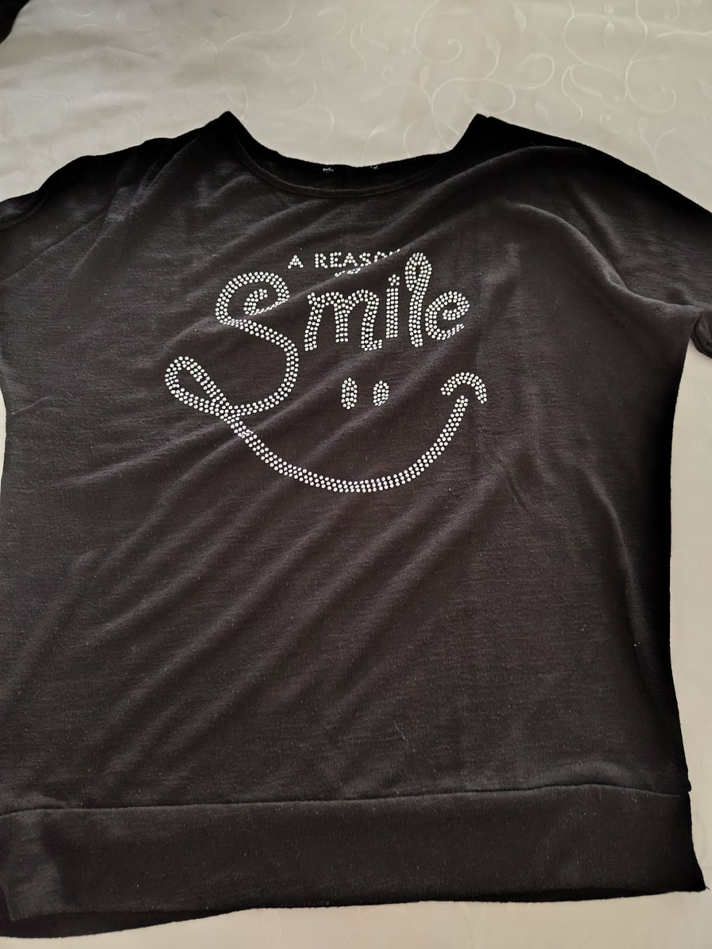 T-shirt: schwarzes Shirt mit Glitzer Smile Gr M – Nuovo (secondo la descrizione) da Brüttisellen venduto da kikaninchen79 2