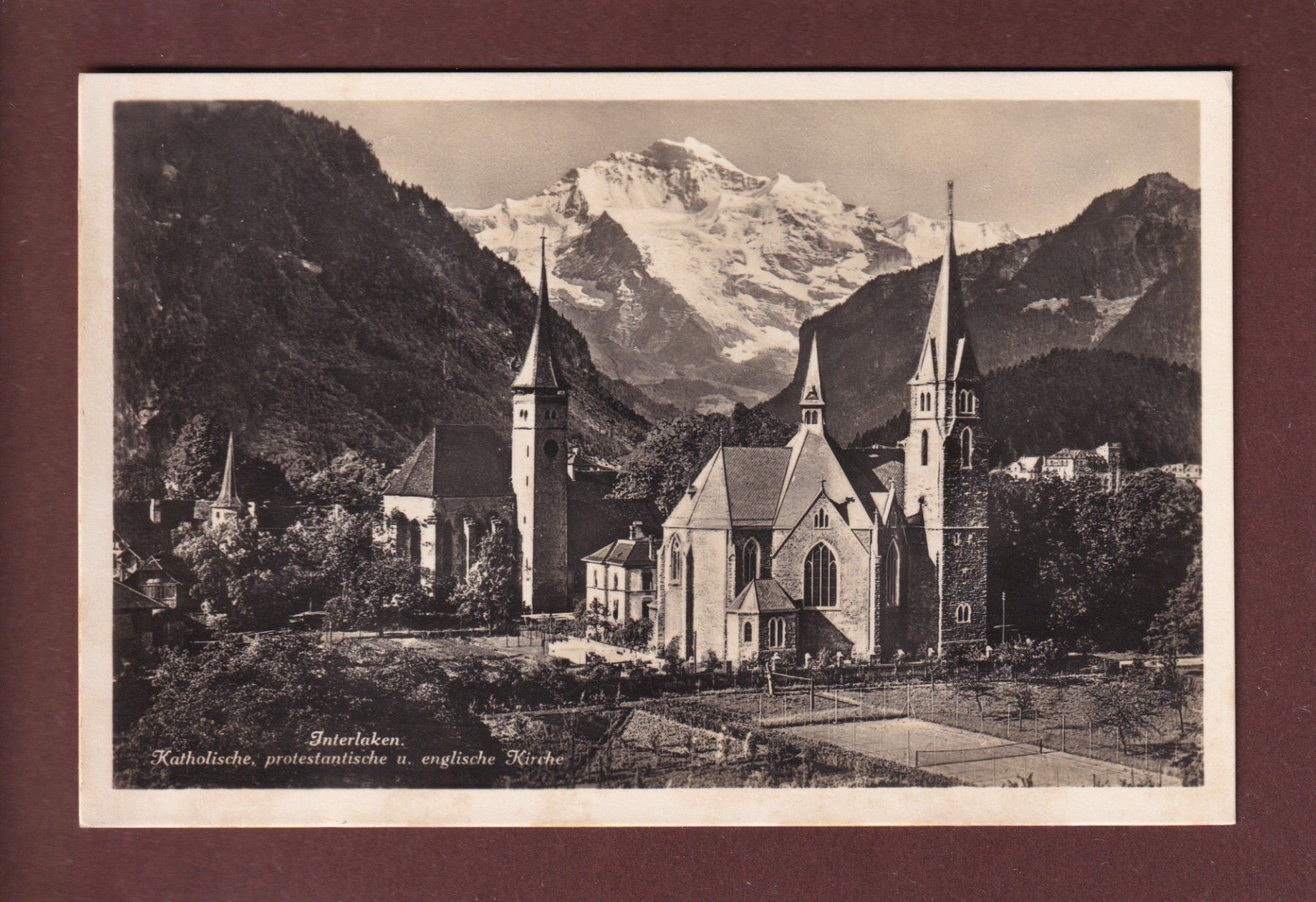 Cartoline postali: INTERLAKEN - Kirche - Jungfrau – Usato da Pully venduto da nicecards