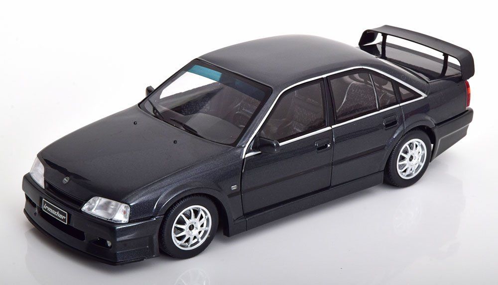 Opel Modellini d'auto: Opel Omega Evolution 500 1991-1992 dunkelgrau met.      1:18 – Nuovo e nell'imballaggio originale da Gerlafingen venduto da espero88