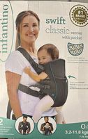Babytrage mit integrierter Tasche