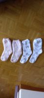 2 Paar neue Flauschsocken mit Sternen