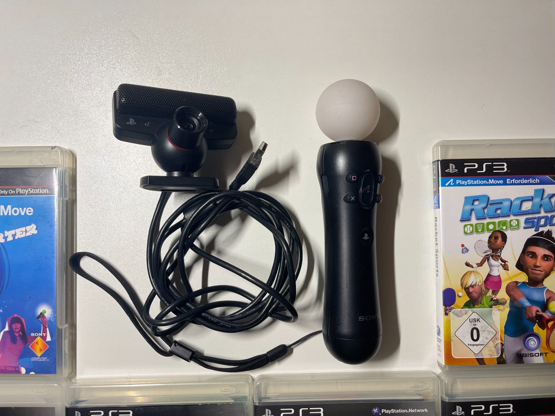 Sony Konsolen: PlayStation 3 Move Motion Controller, 7 games – Gebraucht aus Couvet von  1