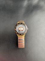 Swatch Armbanduhr gelb schwarz Metallband 
