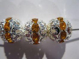 5 Filigrane Metallperlen, versilbert, mit gelbem Strass 10mm
