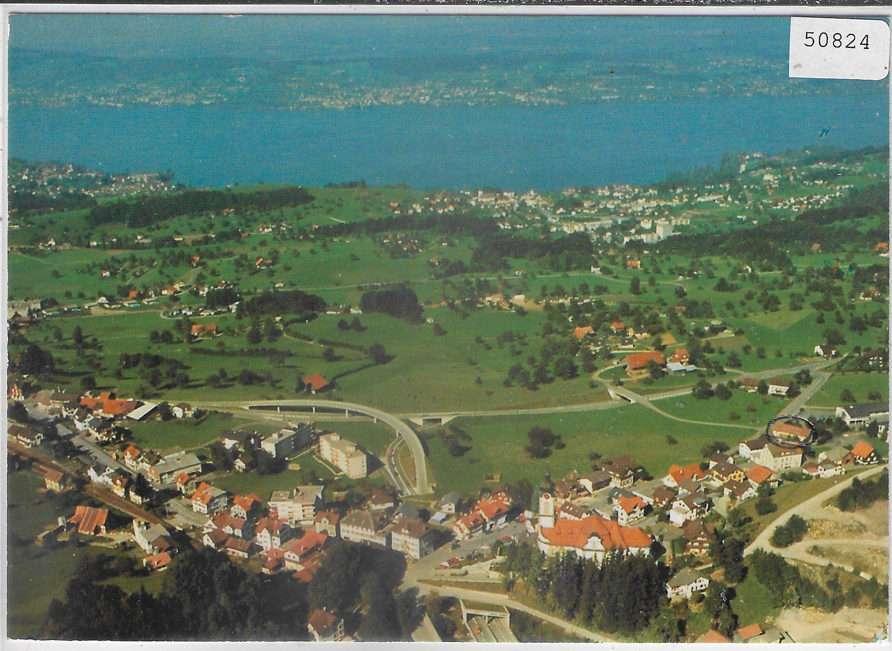 Cartoline postali: Flugaufnahme Schindellegi – Usato da Ettingen venduto da Kartenplanet