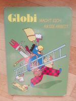 Globi macht sich an die Arbeit