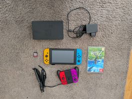 Nintendo Switch + 4 controllers & 2 games