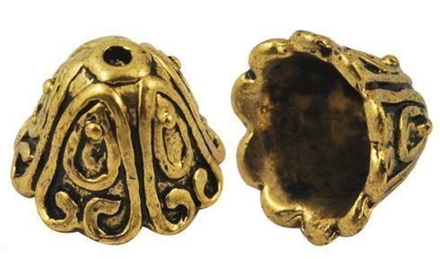 Perle (finte): Perlkappe Röckchen riesig 15x11mm ag – Nuovo (secondo la descrizione) da Alpnachstad venduto da perlengaby