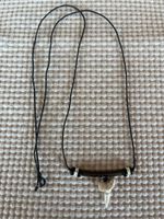 Kette mit Zahn