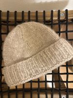 Warme Mütze von der Marke Casimier, teil aus Alpaka, Beige