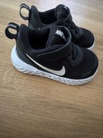 Baskets Nikeenfant noires, T22