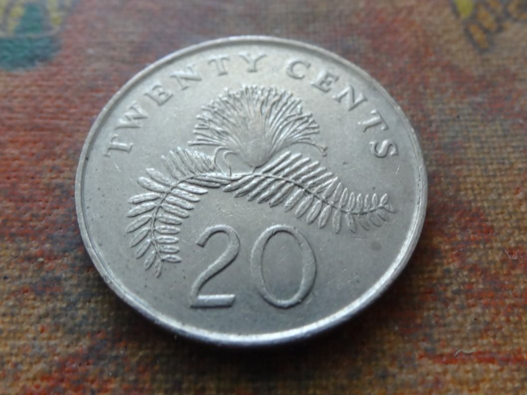 Tutti le monete: SINGAPOUR  20  Cents  1986 – Usato da Romanel-sur-Lausanne venduto da Swift13