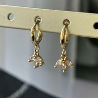 Kleine Goldene Klee Kreolen aus Stahl