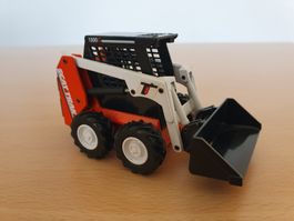 Joal Kompaktlader Scat Trak 1300c im Massstab 1:32